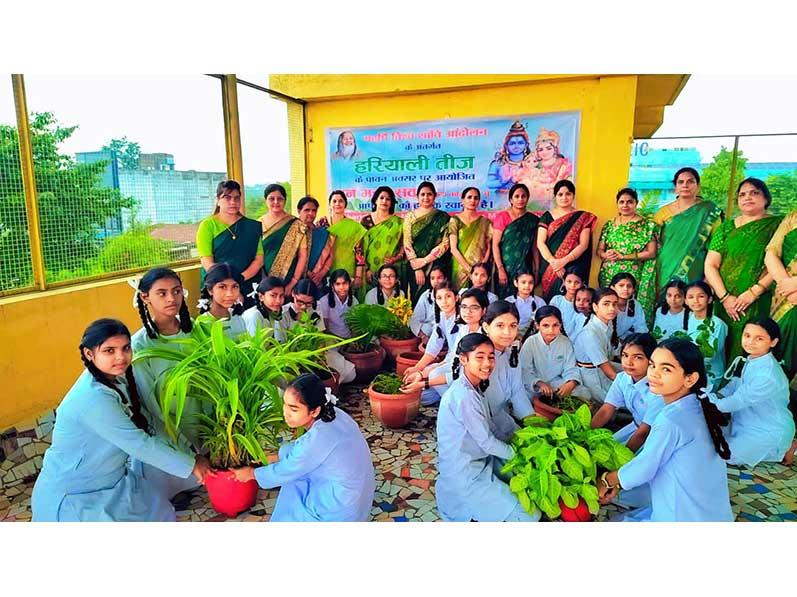 MVM Madan Mahal, Jabalpur: Hariyali Teej festival was celebrated by the ladies staff and girls of class V to Vlll. The students took part in mehndi making and cooking competition of home-made green dishes. Moreover, saplings were planted by both students and teachers with great enthusiasm.